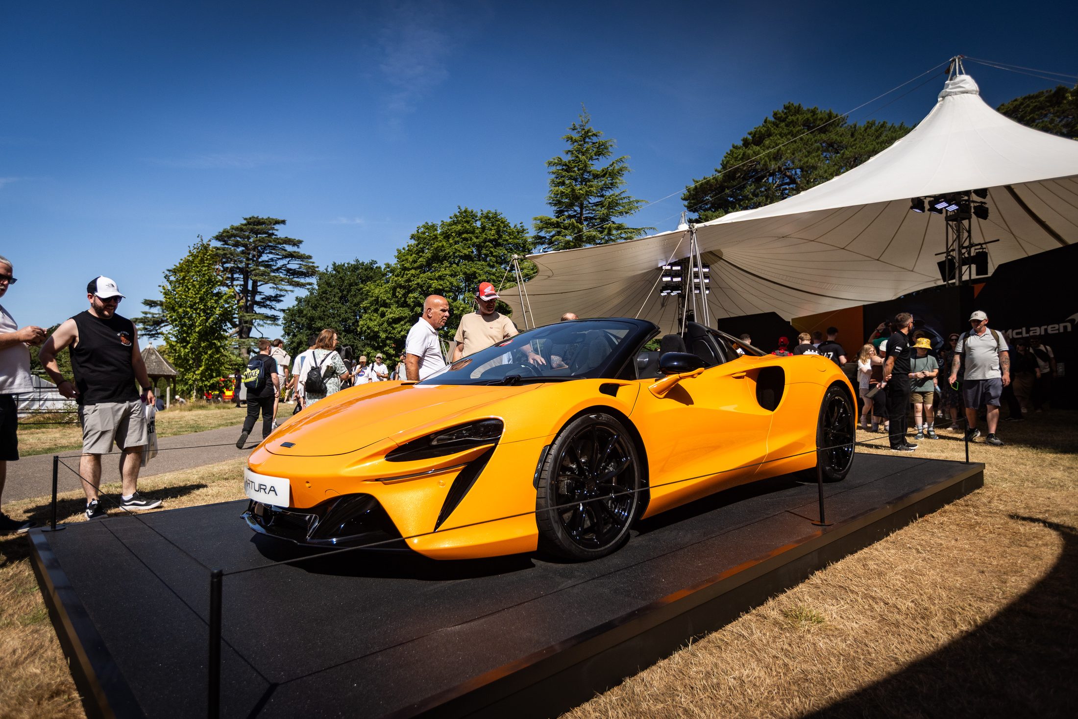 McLaren Artura Spider on the McLaren stand
