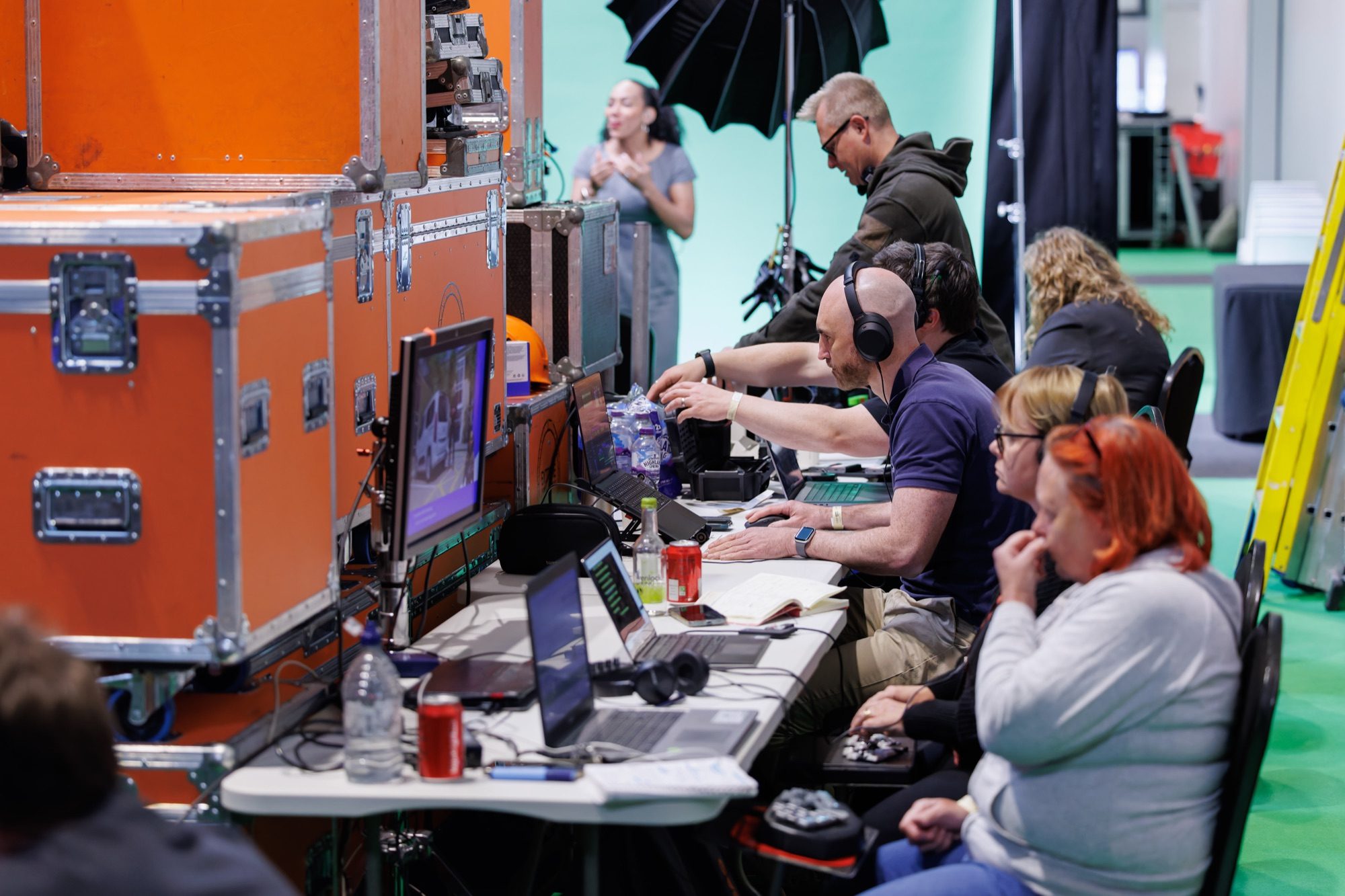 The IRIS gallery on site, the team vision-mixing the live stream from a bank of monitors and laptops